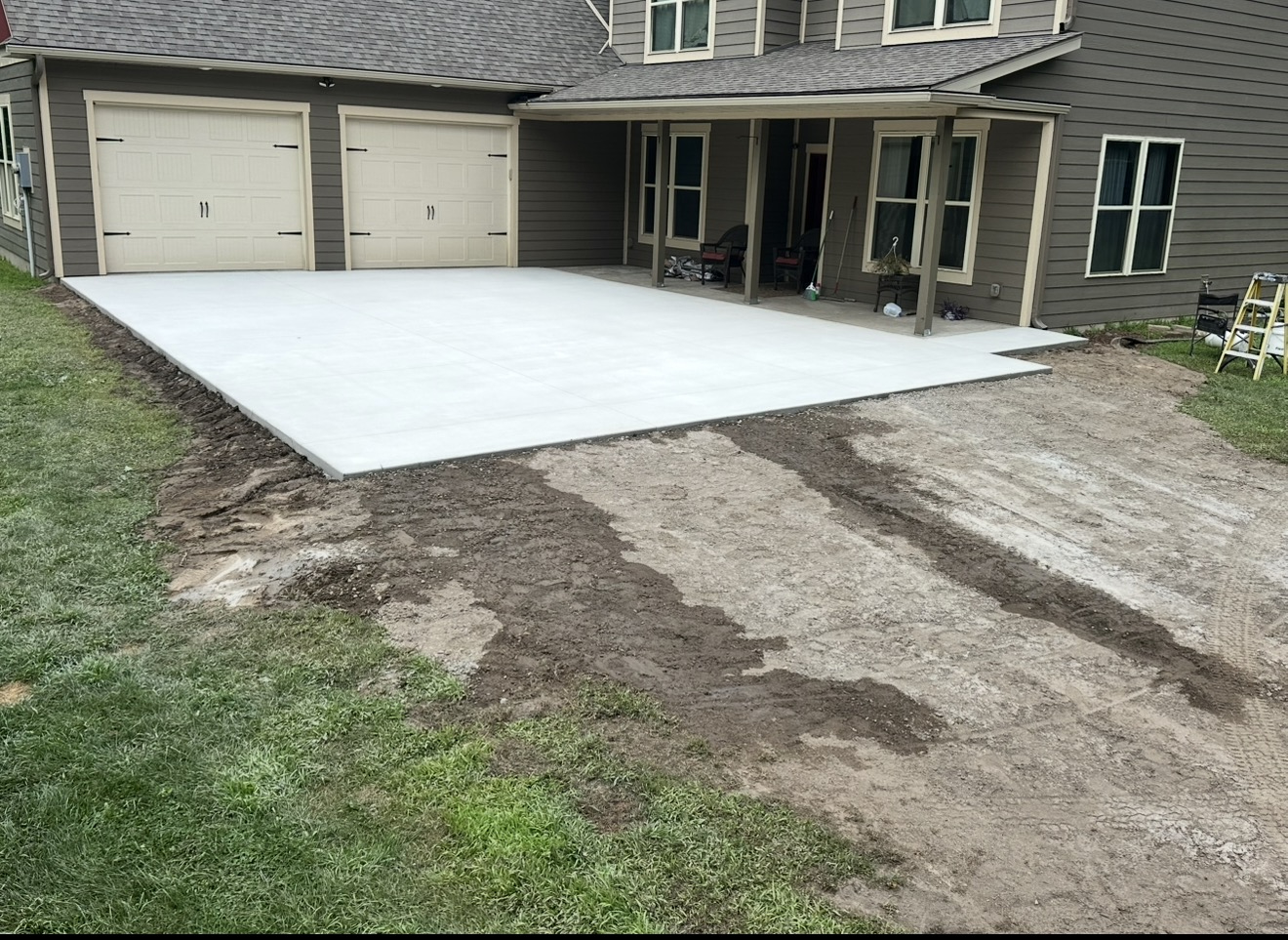 Fresh concrete driveway pour by A&J Custom Concrete in Blaine, MN
