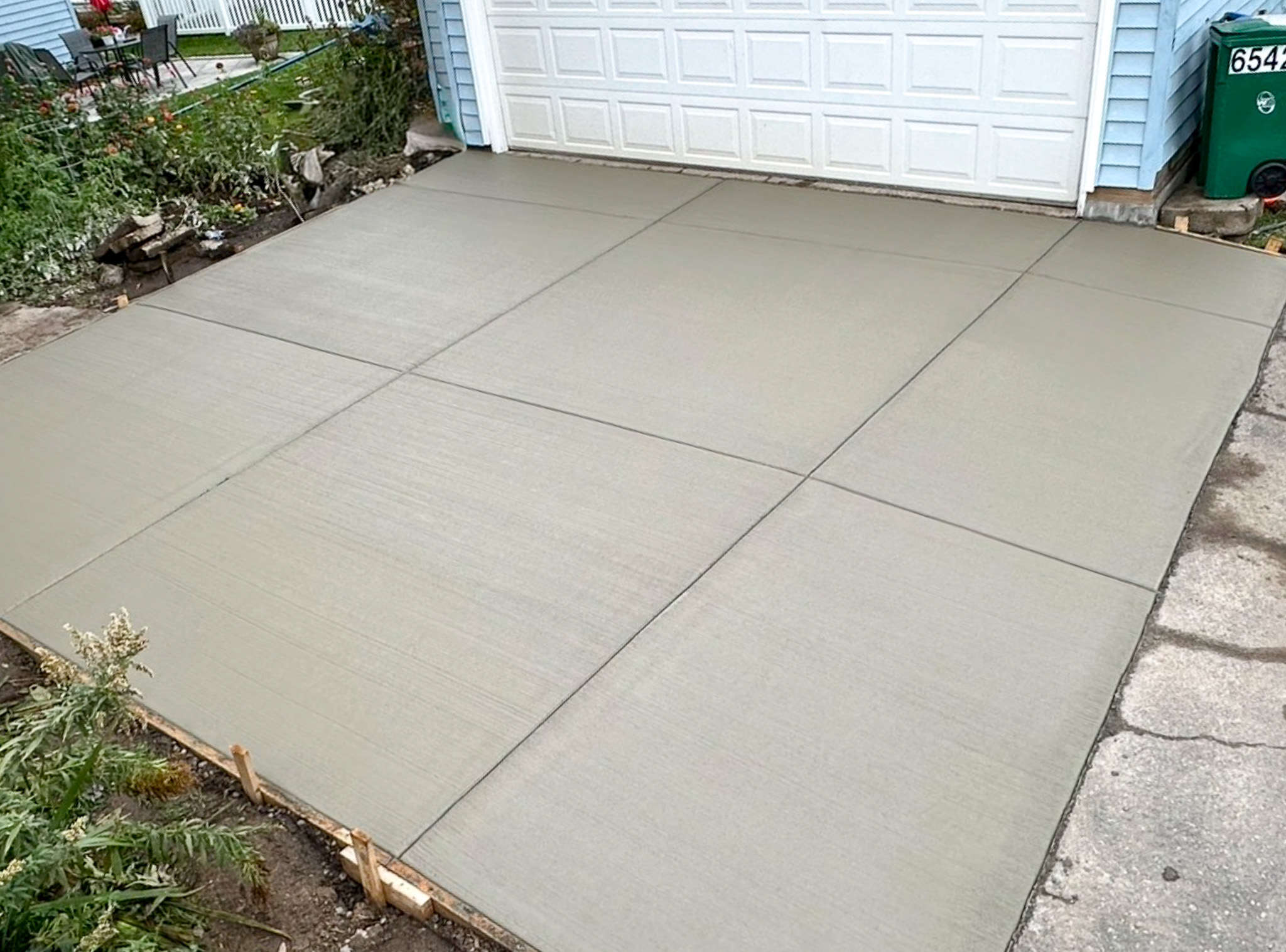 Custom concrete retaining wall in Champlin, MN by A&J Custom Concrete